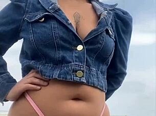 On the beach, she flashed him until he got rock hard, then grabbed and felt his impressive size for herself.