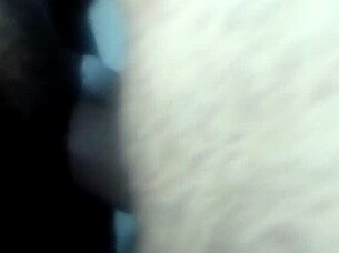 Amateur couple enjoys a steamy blowjob session with her small tits in focus.