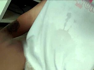 wow, check out this tattooed brunette showing off her natural tits up close!