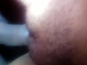 Amateur couple enjoys a steamy blowjob session with her small tits in focus.