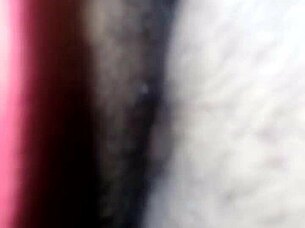 Amateur couple enjoys a steamy blowjob session with her small tits in focus.