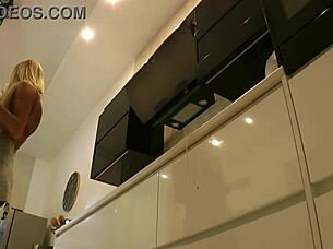 blonde big tits housewife exposes shaved pussy boldly in kitchen