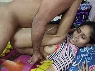 Lonely indian housewife fingers her pussy passionately on sofa.