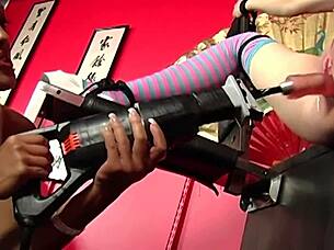 Layla Lust is bound as Maxine X drills her intimate area