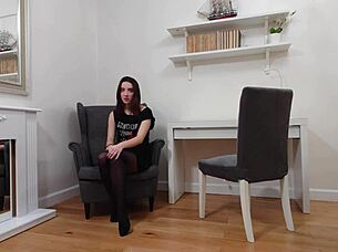 Evelyn models in tshirt and black pantyhose. She teases softly as brunette solo teen.