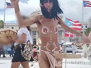 Hairy exotic Latina performs native tribal dance compilation. She flashes small tits and pussy naked in public barefoot.