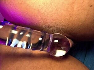 Hey, check out this slut with perky tits squirting milk while fingering her ass and pussy with toys