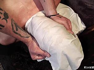 i feel the brunette suspended upside down with one leg bound tightly in intense bondage