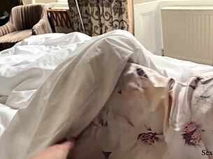 In a casual hotel stay, the milf and young amateur shared a bed, riding to intense orgasm.