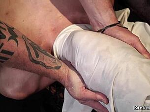 i feel the brunette suspended upside down with one leg bound tightly in intense bondage