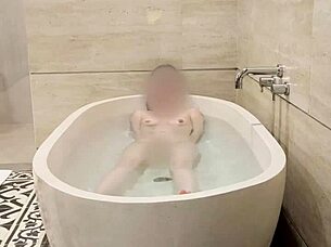 Hey, watch this japanese college student bathing with cute small tits and feet emoji 😊🛁