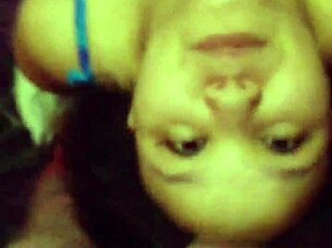 Pretty ebony babe in bikini gets tittyfucked and takes facial cumshot!