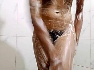 I remember when my mature Japanese friend shared her solo bathing ritual, pissing and washing her hairy pussy in the bath with natural tits on display.