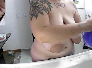 Oh Wow, Watch This Curvy Brazilian Housewife Doing Dishes Naked! Her Huge Saggy Tits And Big Nipples Are On Full Display!