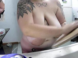 Oh Wow, Watch This Curvy Brazilian Housewife Doing Dishes Naked! Her Huge Saggy Tits And Big Nipples Are On Full Display!