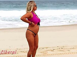 just casually showing off in a micro bikini for the guys at rio beach