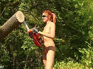 I feel so free sawing wood outdoors in my bikini surrounded by nature