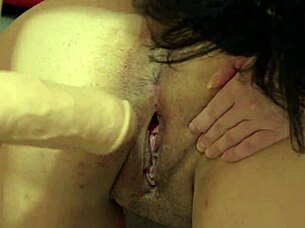 Girlfriend enjoys licking and using huge dildo on her Russian friend's hairy pussy