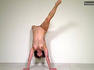 Sofa Nagy performs hot curly hair gymnast stretching on sofa with flexible nude poses