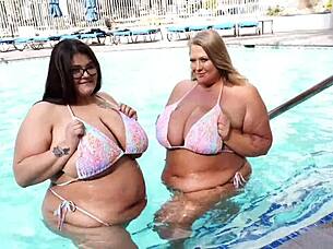 Hey, wanna watch us monster titty twins Veronica Jasmine and Raven Belle drain this lucky guy's huge cock with our massive natural tits?