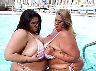 Hey, wanna watch us monster titty twins Veronica Jasmine and Raven Belle drain this lucky guy's huge cock with our massive natural tits?