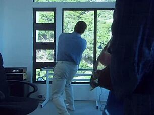 A beautiful girl with small features rode alongside a strong man on a boat