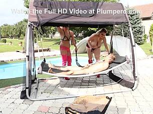 bbw pool sandwich, where the fat femdom bbw in latex heels dominates the skinny submissive outdoors with chunky cock action in a kinky ffm 3some cumshot.