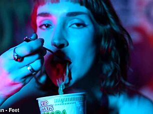 Whoa, check out these sexy feet totally crushing those cup noodles in a wild femdom vibe! 😏👣