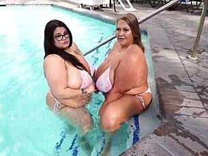 Hey, wanna watch us monster titty twins Veronica Jasmine and Raven Belle drain this lucky guy's huge cock with our massive natural tits?