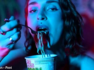 Whoa, check out these sexy feet totally crushing those cup noodles in a wild femdom vibe! 😏👣