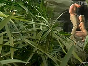 This lucky mofo licked her big clit by the waterfall so she gave him a handjob!