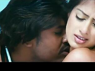 I adore Lakshmi Rai's hot navel play with her hottest boobs and deep kisses