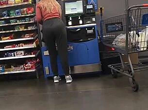 blonde milf struts in tight spandex highlighting her curvy figure and confident style during casual day out