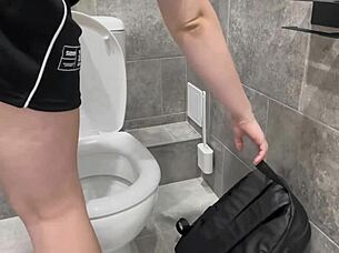 Why Ride That Fat Dildo So Wildly In A Public Toilet?