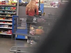 blonde milf struts in tight spandex highlighting her curvy figure and confident style during casual day out