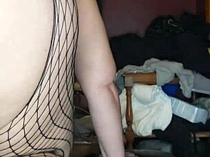 this mature beauty with a big pussy eagerly swallows a massive 14 inch dildo in front of the mirror