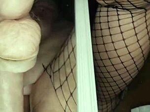 this mature beauty with a big pussy eagerly swallows a massive 14 inch dildo in front of the mirror