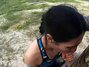 brunette beauty black lynn delivers a sloppy wet blowjob outdoors swallowing every drop with passion