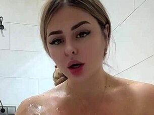 Milf wife with huge natural tits, do you crave two cocks while masturbating in the bathtub?