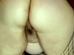 this mature beauty with a big pussy eagerly swallows a massive 14 inch dildo in front of the mirror