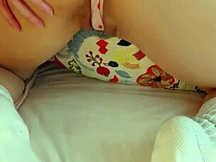 This tiny young Asian teen uses a vibrator on her clit. She cums hard in her tight panties from the panty bank.