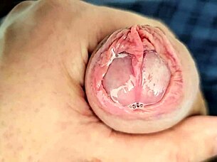 Hey, you wanna see all this precum dripping while I edge my massive unique cock slowly?