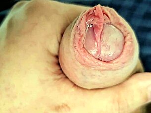 Hey, you wanna see all this precum dripping while I edge my massive unique cock slowly?