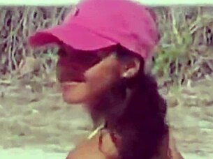 omg, check this unbelievable young girl in a micro bikini chilling on the beach with her boyfriend's relatives 😍🏖️