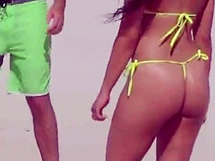 omg, check this unbelievable young girl in a micro bikini chilling on the beach with her boyfriend's relatives 😍🏖️