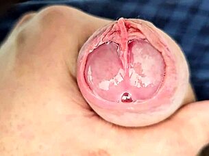 Hey, you wanna see all this precum dripping while I edge my massive unique cock slowly?
