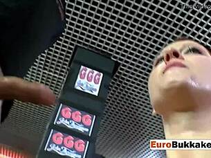 chubby redhead slips into lingerie for a wild bukkake orgy with multiple guys banging and pissing on her.