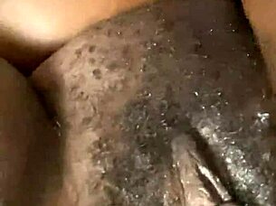 In a quiet setting, the solo ebony girl explores her feelings of excitement alone