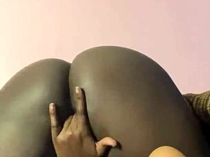 In a quiet setting, the solo ebony girl explores her feelings of excitement alone