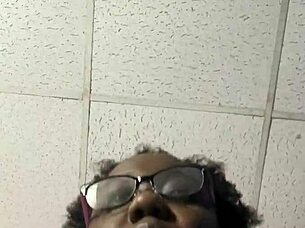 In a quiet setting, the solo ebony girl explores her feelings of excitement alone